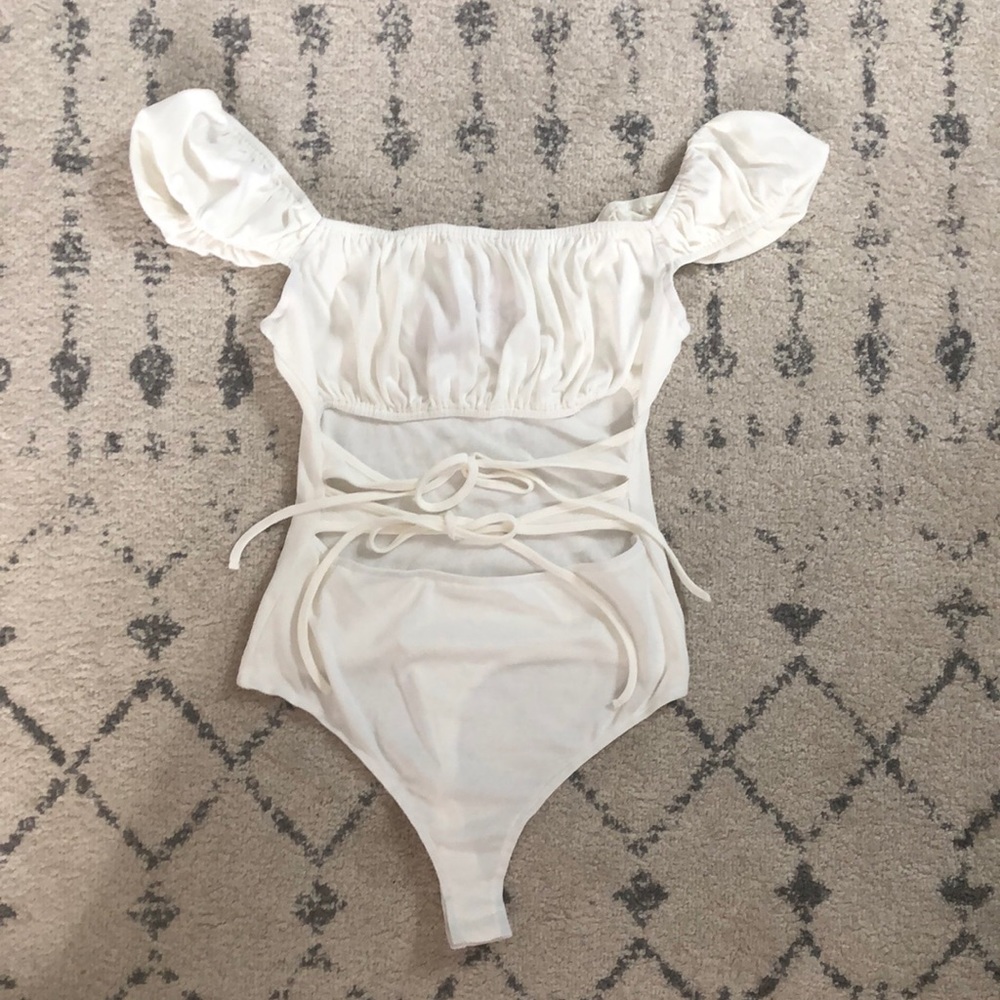 white cut-out bodysuit